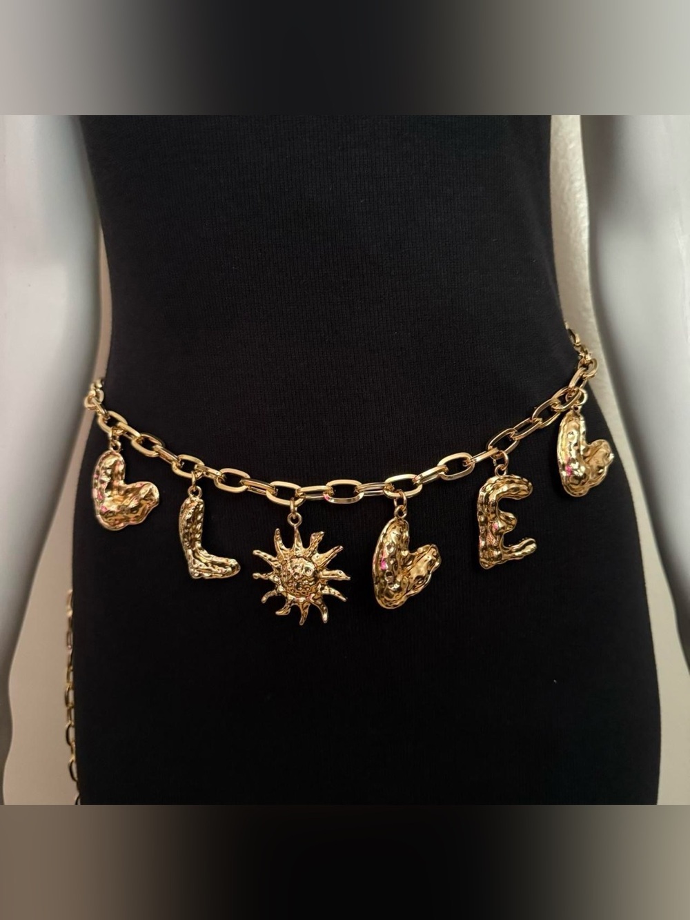 Gold tone metallic charms chain belt